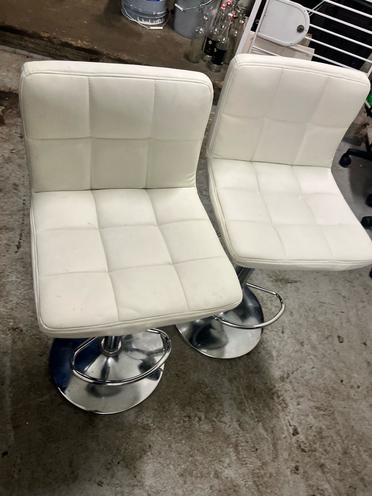 2 white leather bar stools