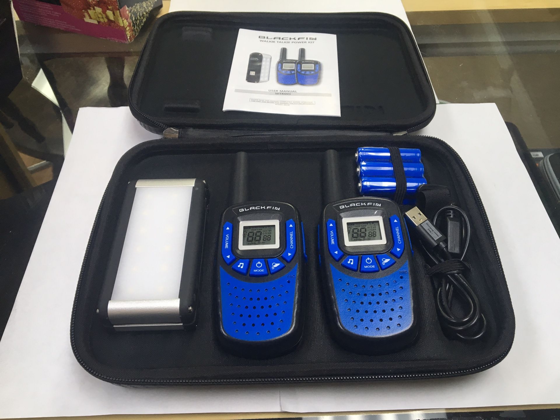 Black fin Walkie Talkie Set - Hardly used condition. Comes with travel case. 23 mile range, voice control, blue and black, 22 channels with auto sea