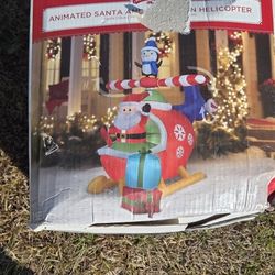 Animated Santa And Penguin In Helicopter 