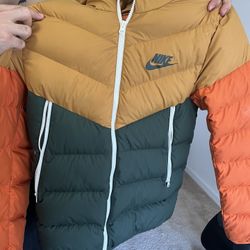 Nike orange small store logo padded jacket