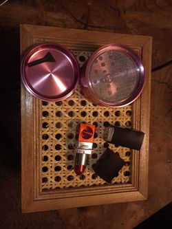 Brand new grinder and fake lipstick pipe