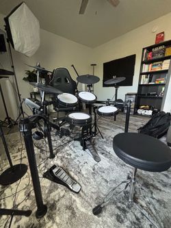 Electric drum set: Donner DED-200 with amp (value: $750)