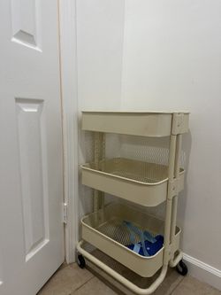 Three Tier Shelf With Wheels