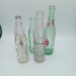 5 vintage soda bottles