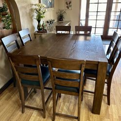 Costco Counter Height  Dark Rubberwood Kitchen Table with 14” leaf, 8 Chairs with Bonded Leather Seats