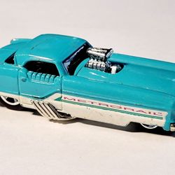 2000 Hot Wheels 23/36 Nash Metrorail First Edition Blue/White Die-Cast 1:64 Car Scuffed Used Condition. See Pics. The image shows a Hot Wheels Metrora