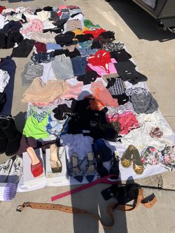 A Lot Of Female Clothes And Shoes/heels