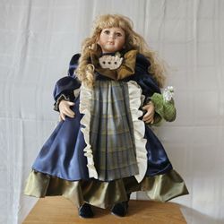 Vintage porcelain doll by Madison Lee edition number 3/1999.  25" tall