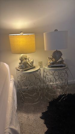 Two sets of golden metallic night stands and two sets of lamps