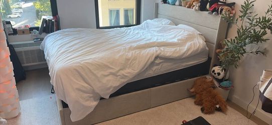 Queen upholstered storage bed frame
