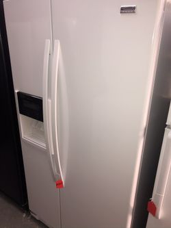 Used kenmore Elite side by side fridge. 1 year warranty