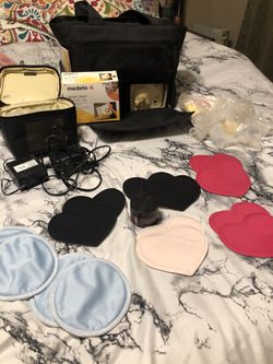 Nursing pads and medela in style pump