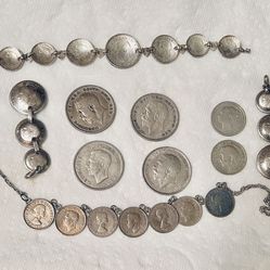 Sterling silver. A massive collection.  Coins. Rosary. A solid silver multi strand bracelet with charms and more.