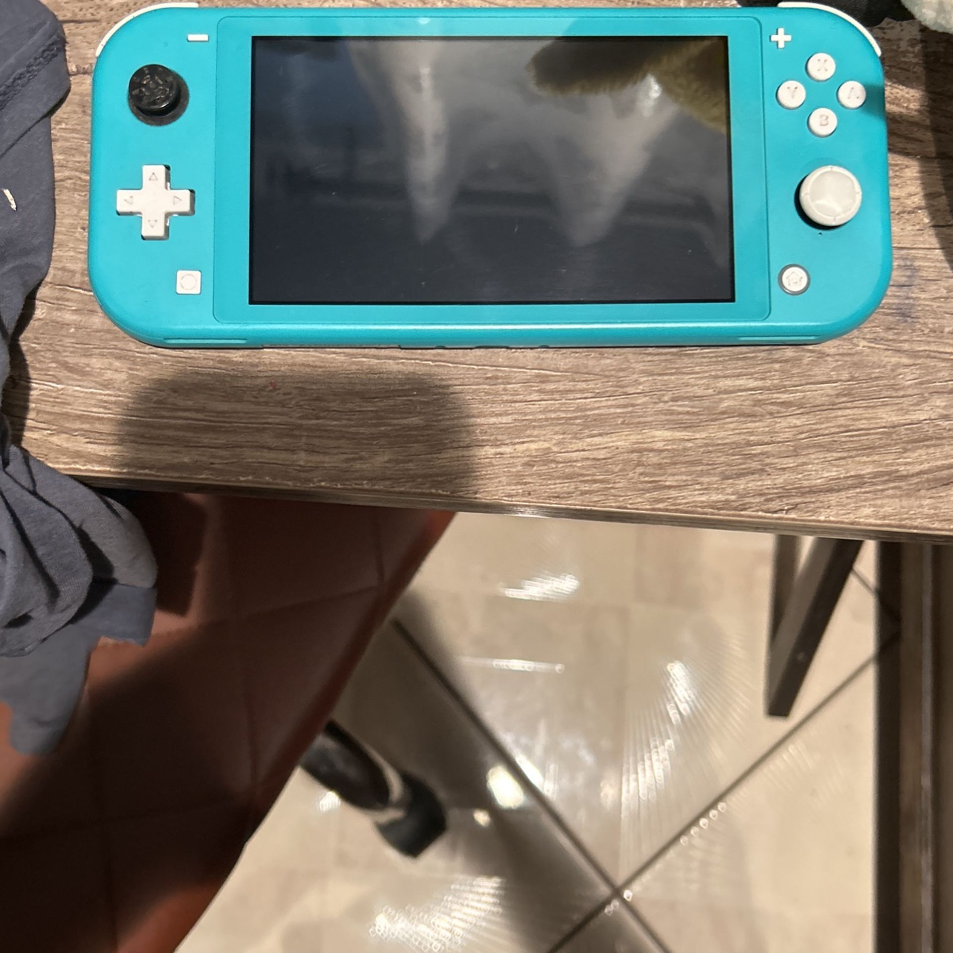 Nintendo Switch Lite With Jump force Deluxe game Included