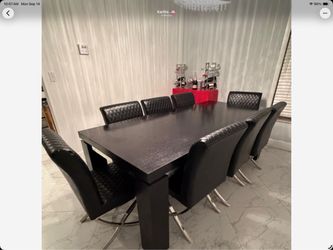 Modern Dinning Room with 8 leather chairs