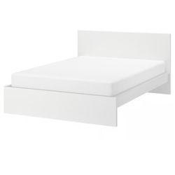 King-size bed frame, white, without mattress.