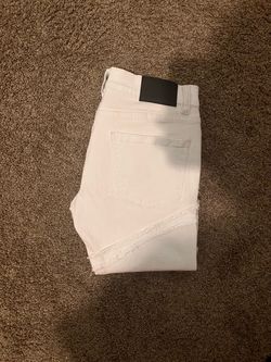White stacked jeans