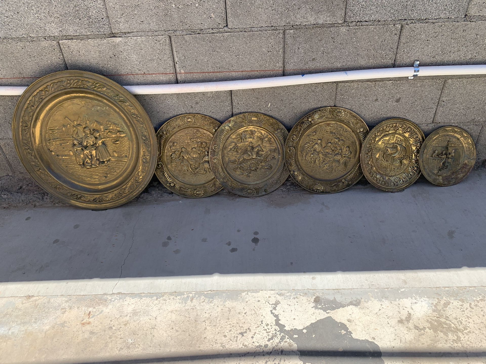 6 vintage brass plates