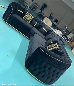 Black Tufted Sectional Sofa with Gold Accents