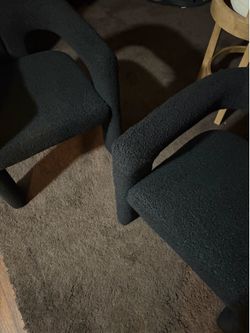 2 soft black wool chairs