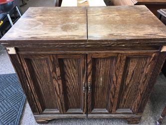 Sewing machine cabinet