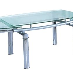 Dining room table, glass top with steel frame in excellent condition  and 6 chairs