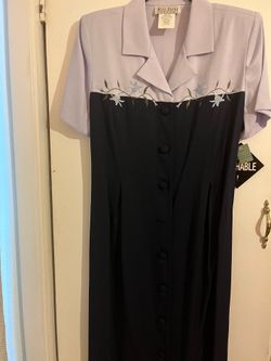 Vestido azul marino con gris y bordado