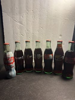 7 Vintage Coca-Cola Commemorative Bottles Blazers NASCAR Holiday 1(contact info removed)