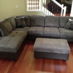 Grey Microfiber Sectional Couch And Ottoman 