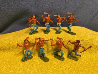 8 Multi colored plastic Indians. + Shpg