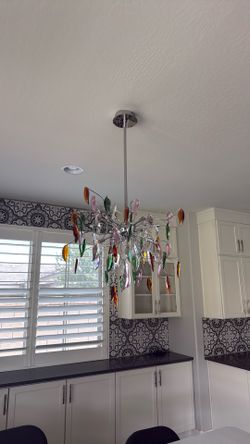 Colorful Crystal  chandelier used in eat in kitchen