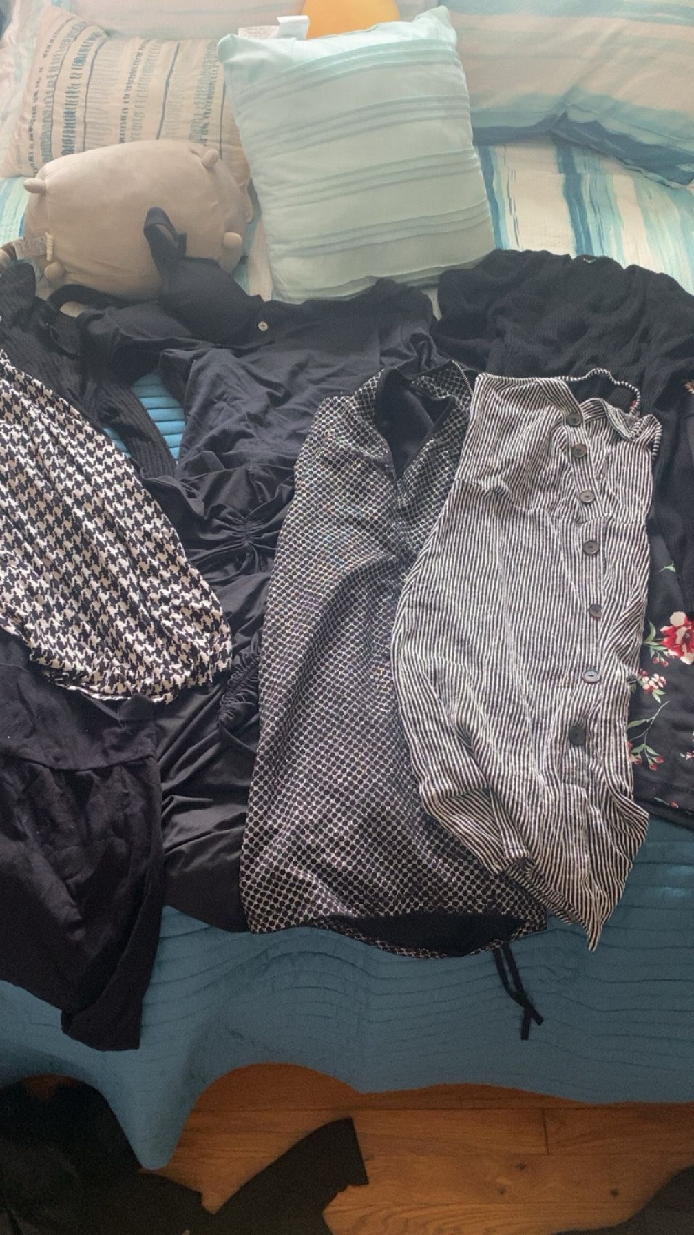 Bag Of Black Dresses Shirts And Pants