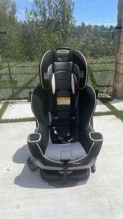 Graco Nautilus-style combination car seat with a 5-point harness and adjustable headrest.
