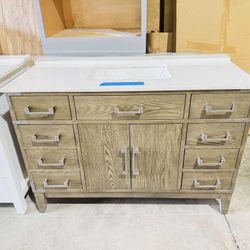Beautiful Bathroom Vanity in Gray oak 48”, single sink, soft close and solid wood. $599 