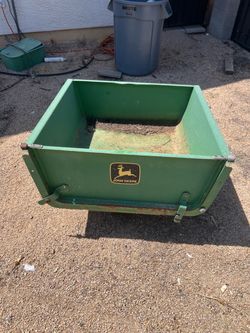 John Deer tow behind mower dump trailer