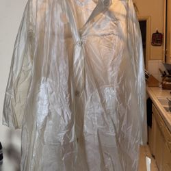 Clear Waterproof Raincoat with Snap Closure 1970