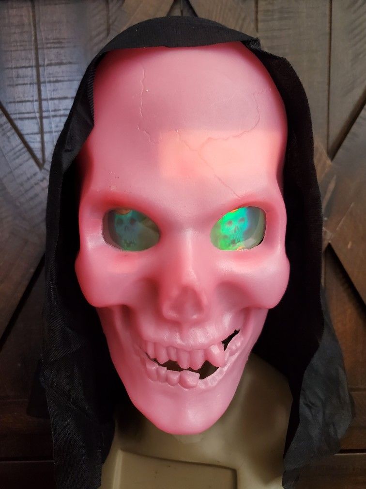 Vintage 90s NOS Hologram Eyes Skull Halloween Mask Glowing Pink By Clown Alley
New out of Package