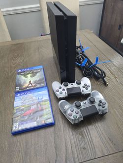 Playstation 4 original with 2 controllers  tested ready play