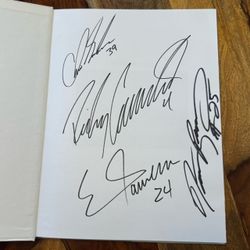 Autographed copy of American Motocross Signed by Ricky Carmichael & Others