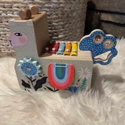 Manhattan Toy Lili Llama Musical Wooden Instrument.