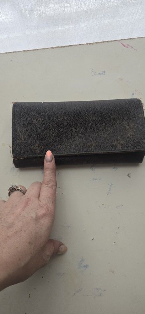 Genuine Wallet Torn