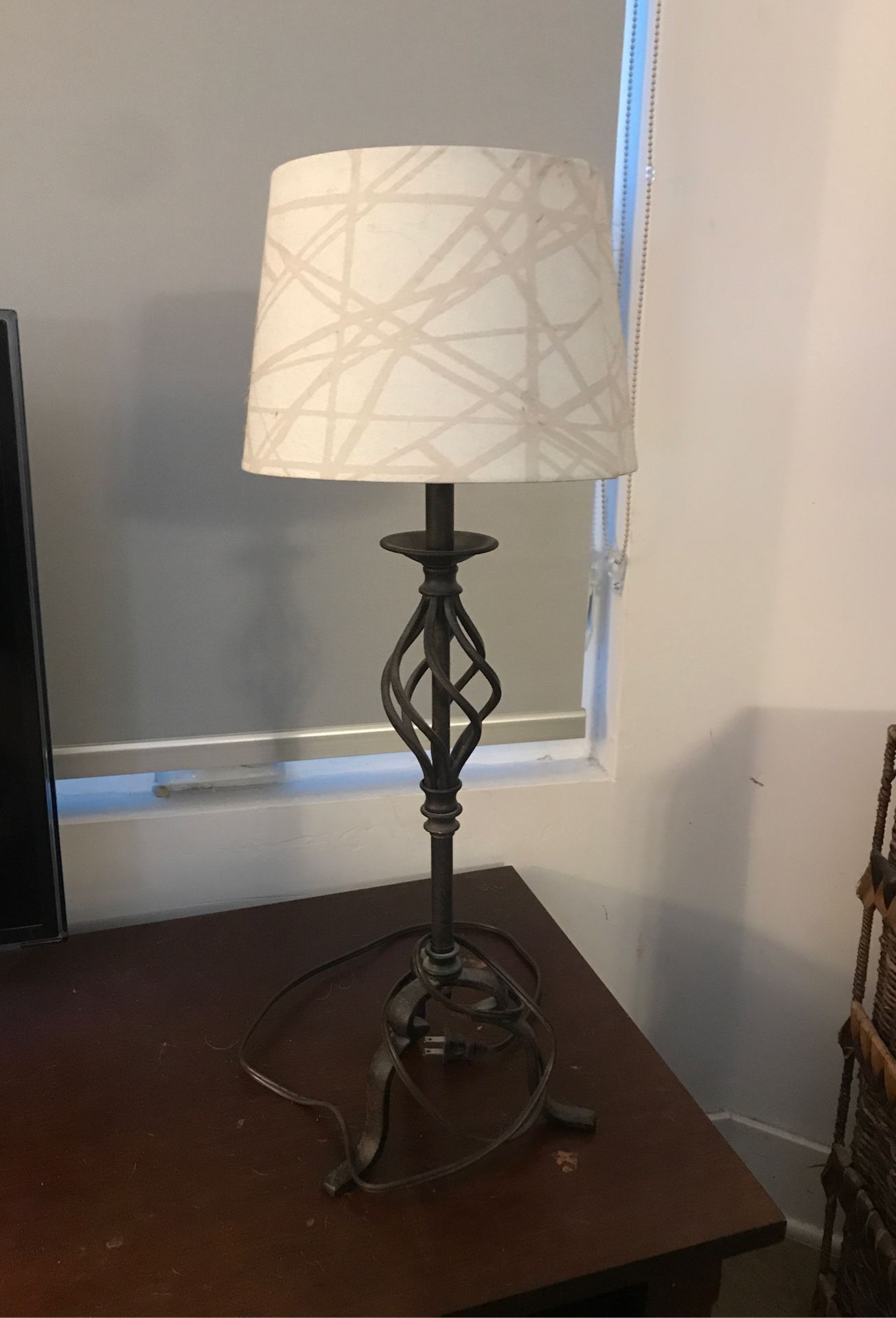 Wrought iron lamp with shade