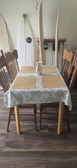 Wood table with vintage chairs