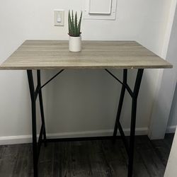 Tall table. No chairs.