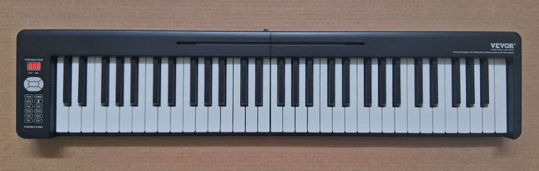 Foldable 61 Key Piano Keyboard With 127 Sounds Built-in Battery And Amplifier Speaker