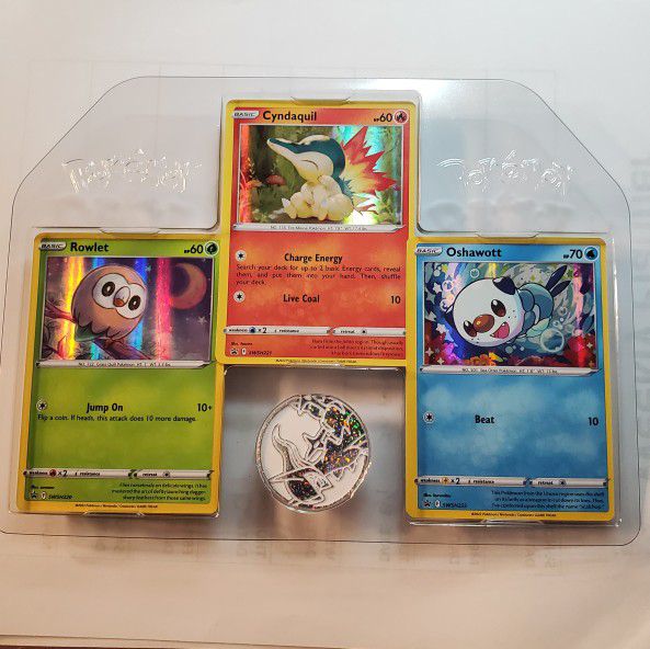 Lot of 3 Pokémon cards (cyndaquil, oshawott, rowlet)