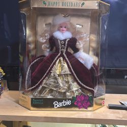 Unopened Holiday Barbies
