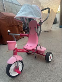 Pink Radio flyer tricycle