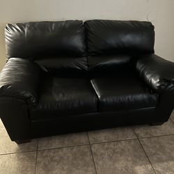 Black leather couches
