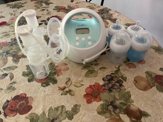 Spectra Pump w/ 4 Bottles